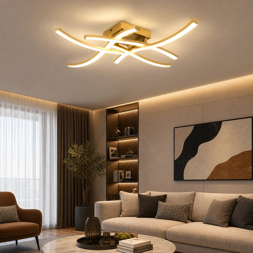 Luminária de teto LED dourada com design curvo instalada em sala contemporânea