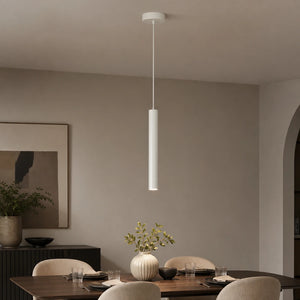 Luminária pendente tubular branca em sala de jantar