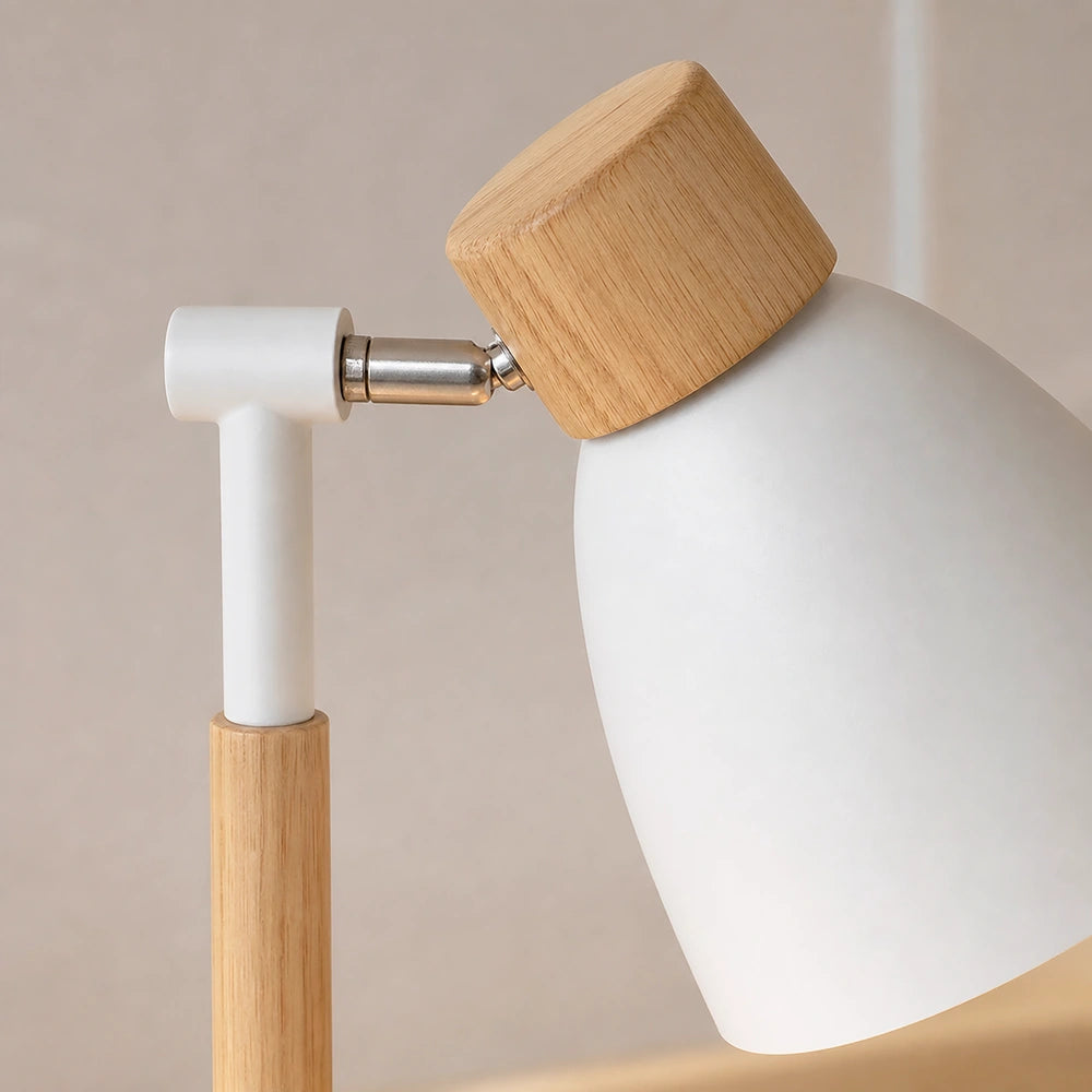 Detalhe do braço metálico e articulação da luminária branca