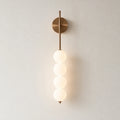 Luminária de parede com 4 globos em acabamento cobre