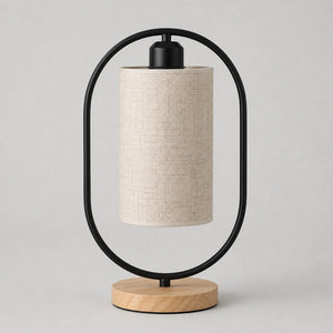 Variante preta da luminária de mesa oval com base de madeira