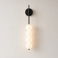 Luminária de parede com 4 globos em acabamento preto
