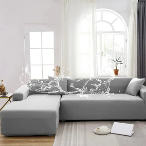 Capa de sofá cinza-claro em ambiente de sala com chaise