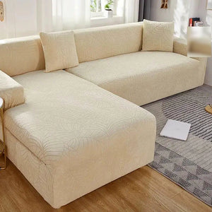 Capa de sofá jacquard creme no ambiente principal da sala