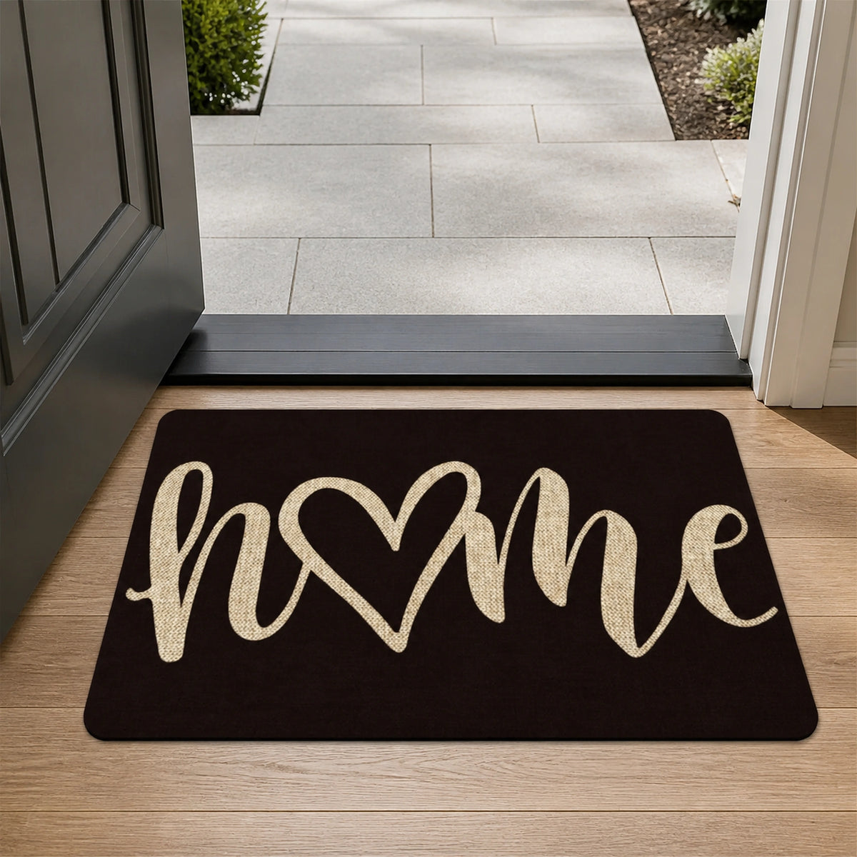 Capacho Home posicionado junto à porta de entrada – Viorenna
