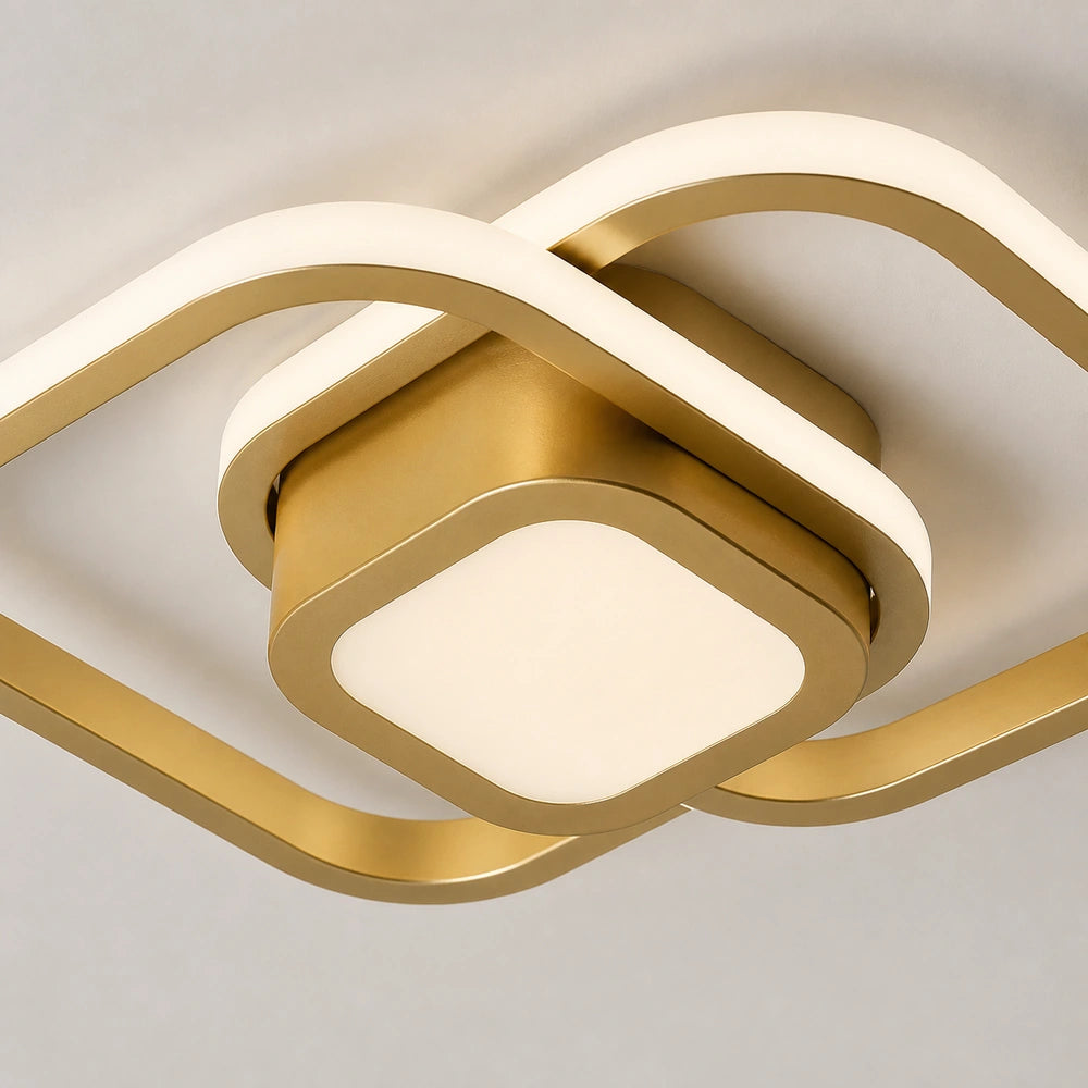 Detalhe da base central do lustre LED de teto dourado quadrado