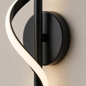 Detalhe da base circular e da fixacao da arandela espiral