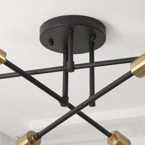 Detalhe das hastes cruzadas e da canopla do lustre moderno
