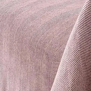Detalhe da textura real da capa de sofá rosa