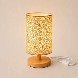 Luminária de mesa floral com base de madeira acesa na variante Luz Quente