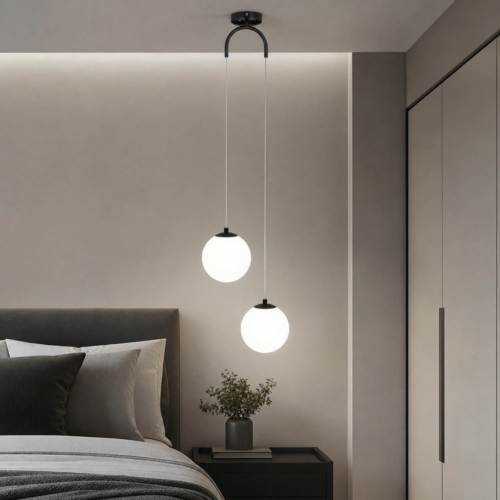 Lustre pendente preto com 2 luminárias aplicado em quarto moderno