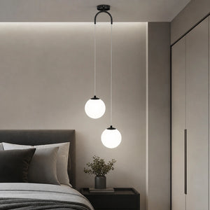 Lustre pendente preto com 2 luminárias aplicado em quarto moderno