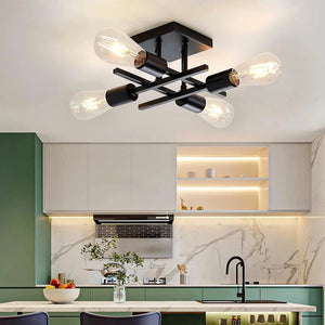 Lustre Sputnik preto com dourado em cozinha moderna