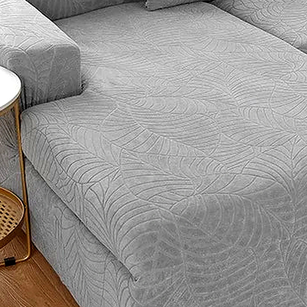 Detalhe do relevo em folhas e acabamento da capa de sofá jacquard