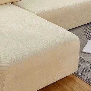 Detalhe da textura jacquard de aparência aveludada da capa creme