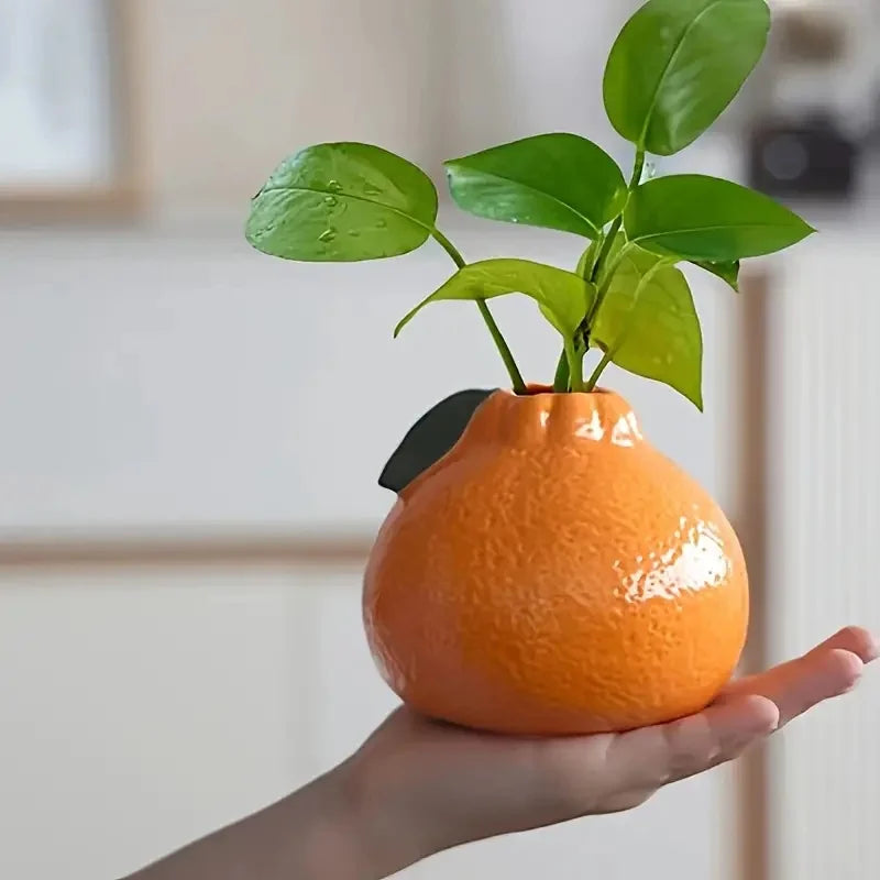 Vaso Decorativo Laranja Escultural de Cerâmica para Mesa em sala decorada