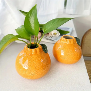 Vaso Decorativo Laranja Escultural de Cerâmica para Mesa em sala decorada